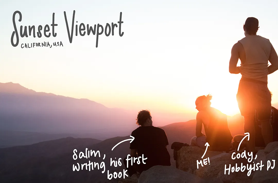 Friends watching the sunset from a coastal viewpoint
