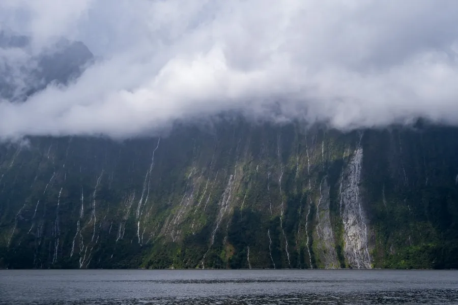 Milford Sound fjord with dramatic peaks and waterfalls