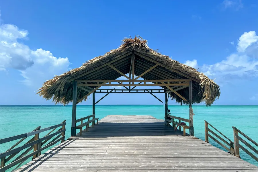 Turquoise Caribbean water on a white sand beach