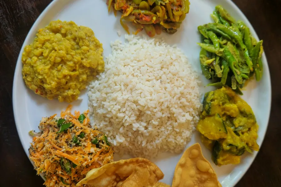 Traditional West African jollof rice with grilled fish